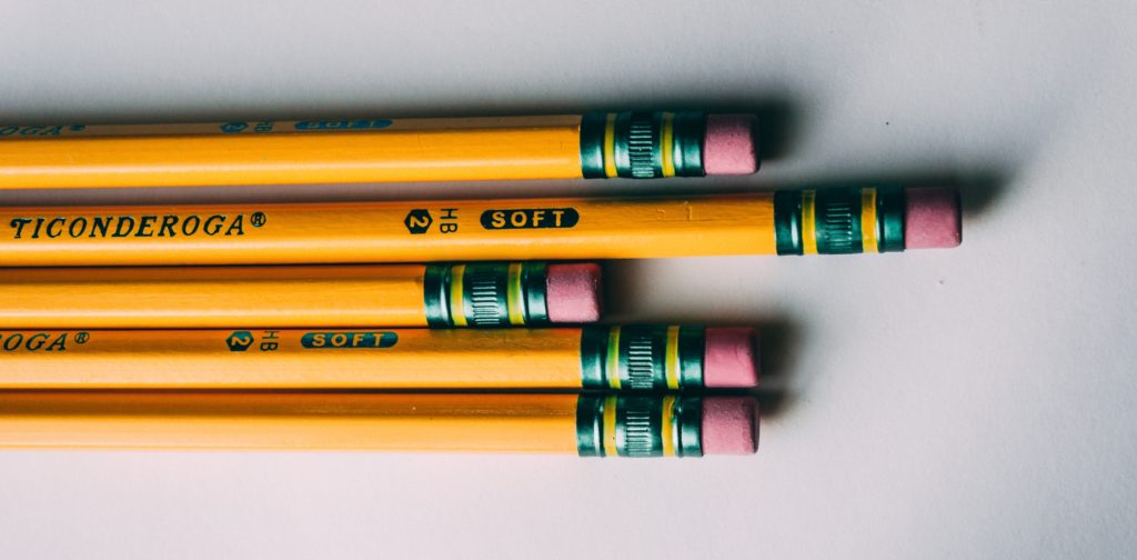Picture of five wooden pencils, ready to be used for a big test.