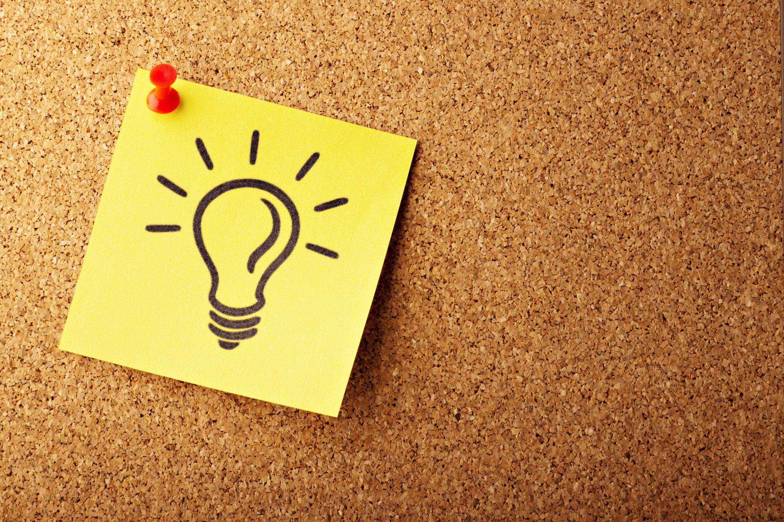 Note paper with an light bulb 