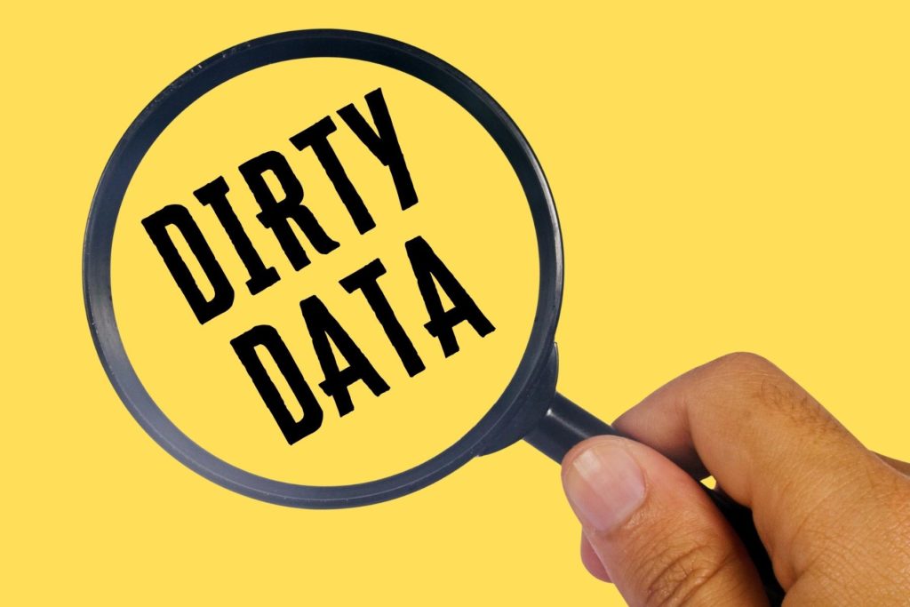Magnifying glass over the words "Dirty Data."