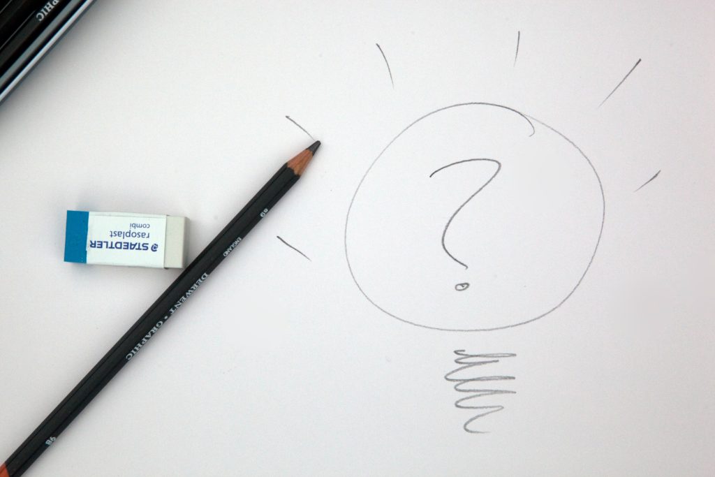 Image of a sketch of a lightbulb, with a question mark inside of it.