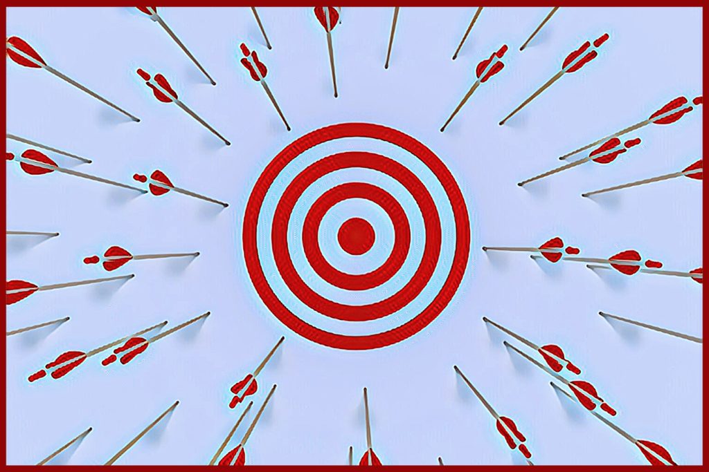 Image of a target, with arrows all around, but none in the circles.