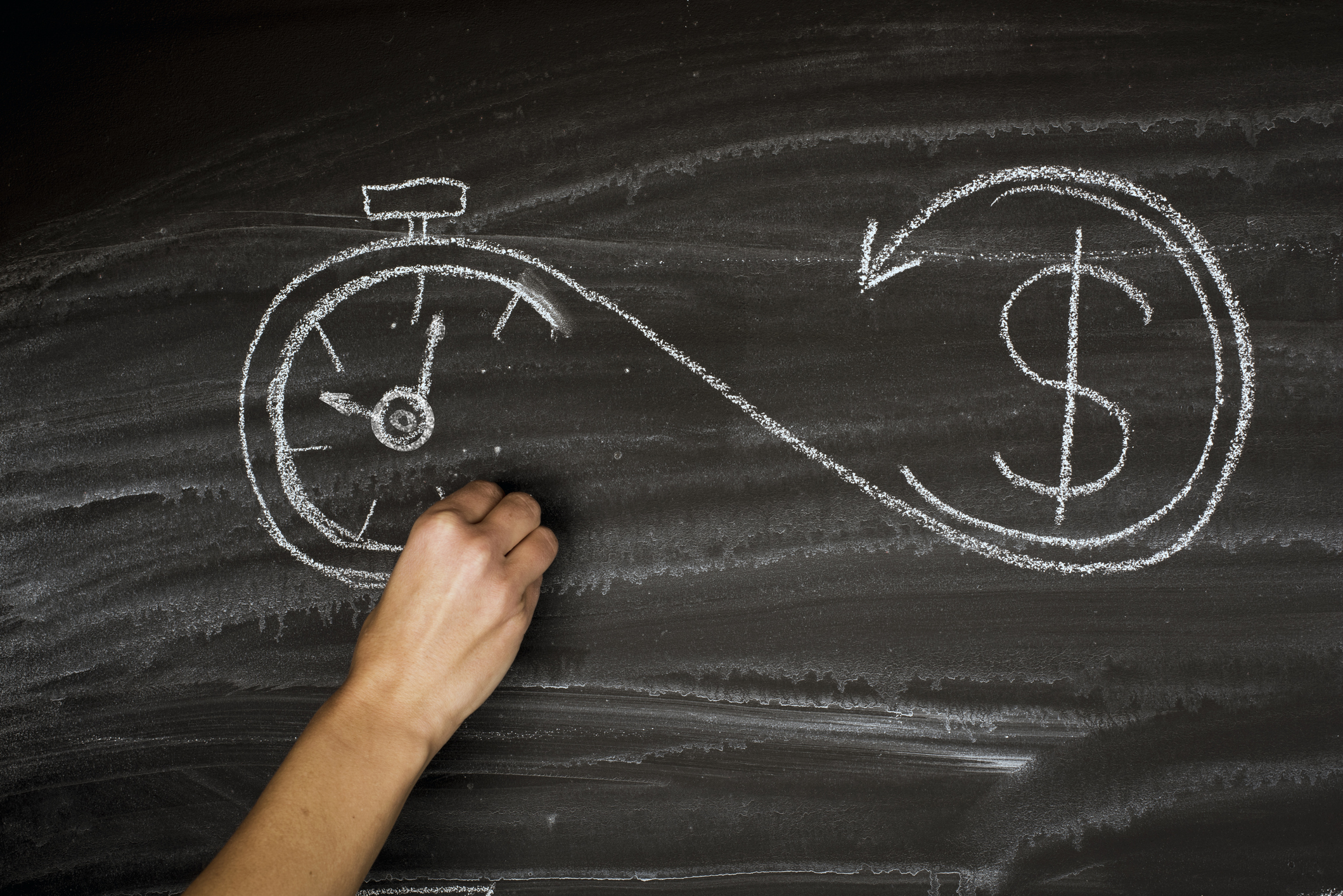 Artists drawing on a chalkboard, a stop watch and a dollar sign, encircled by a sideways figure eight.