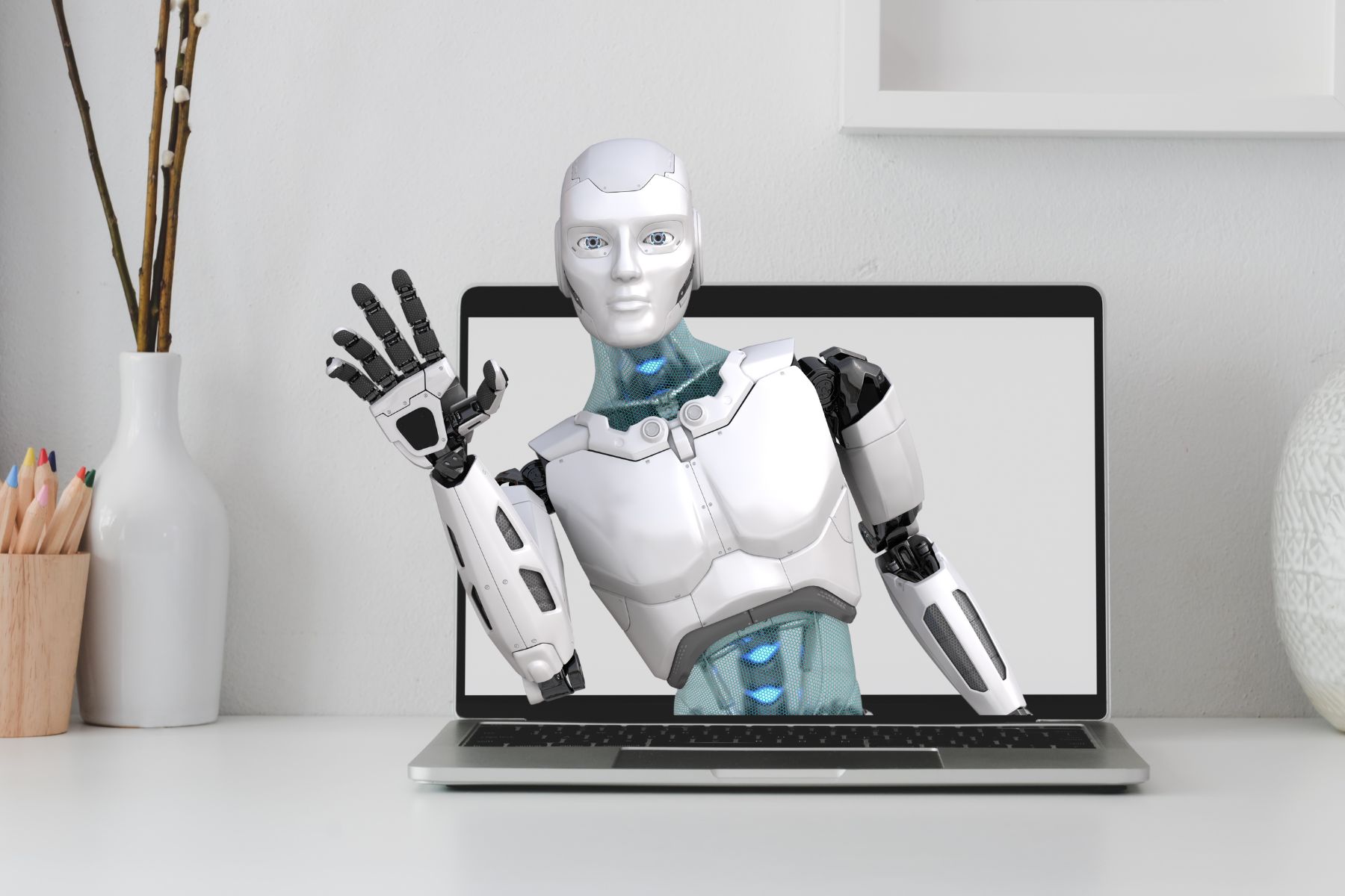 picture of a robot poking out of a laptop computer