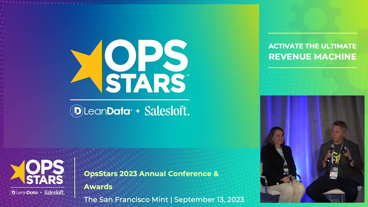 A blue and green gradient rectangle with an image of two speakers from the OpsStars 2023 conference
