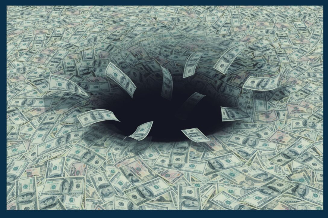 money being sucked down a black hole