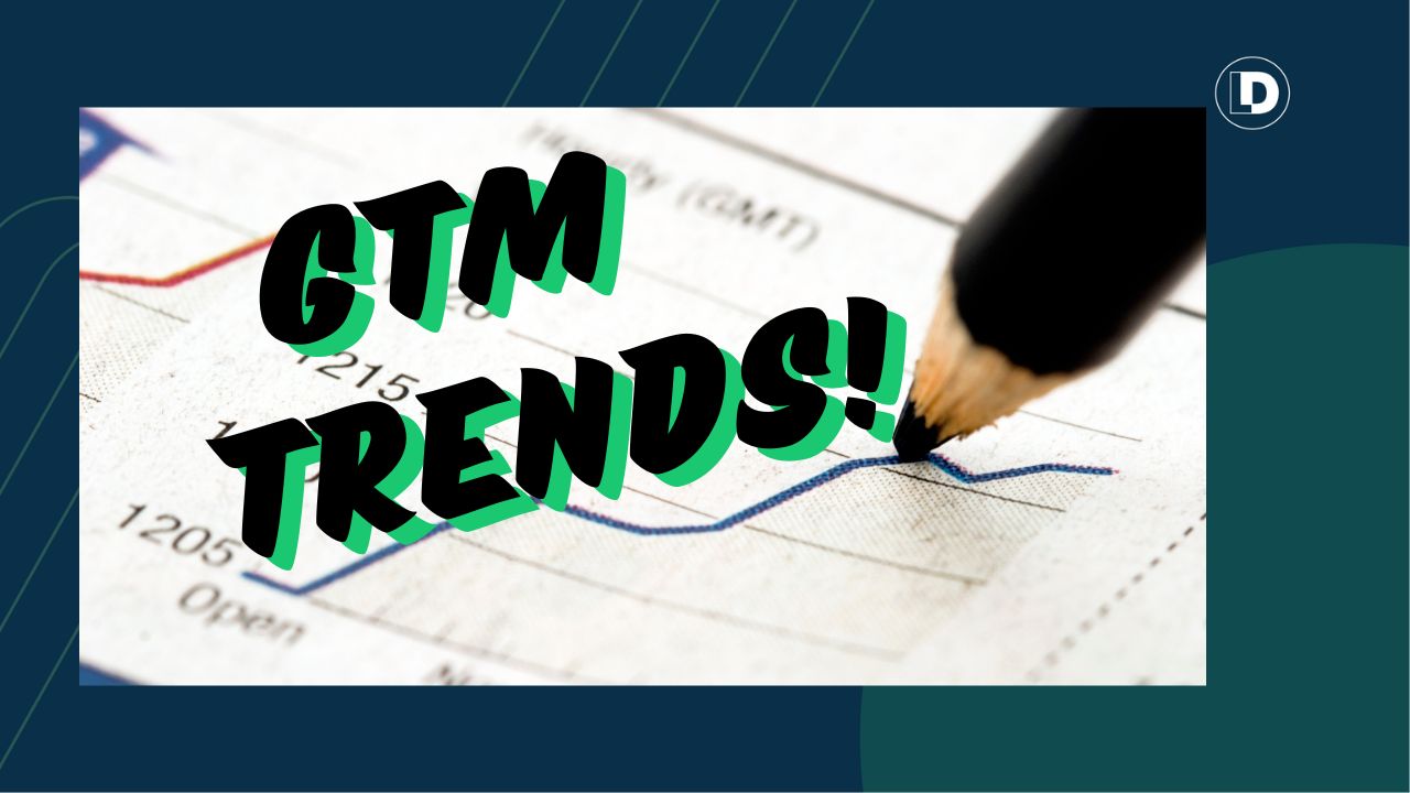 a pencil writing on a line graph next to the words GTM trends