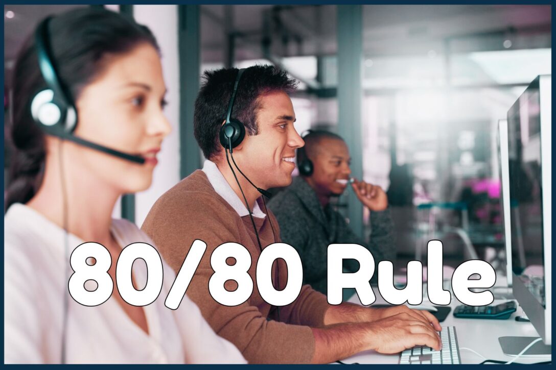 sales reps wearing headsets sitting at computers in an office