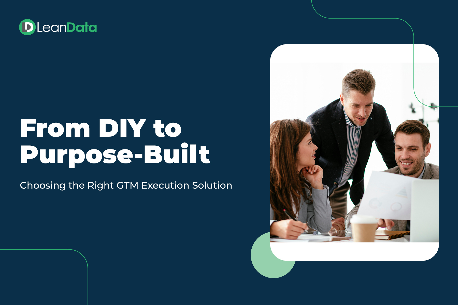 three office workers talking to each other at a desk