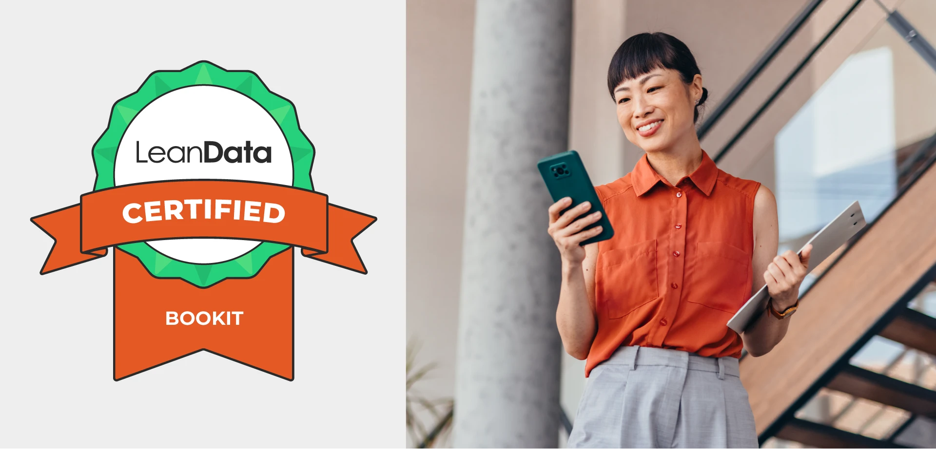 LeanData BookIt Certification - Woman looking at her phone smiling