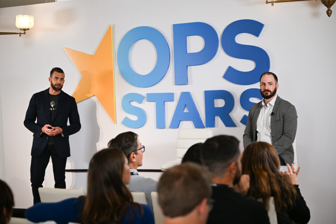 Kieran Snaith and Ryan O'Shea speaking at OpsStars 2025
