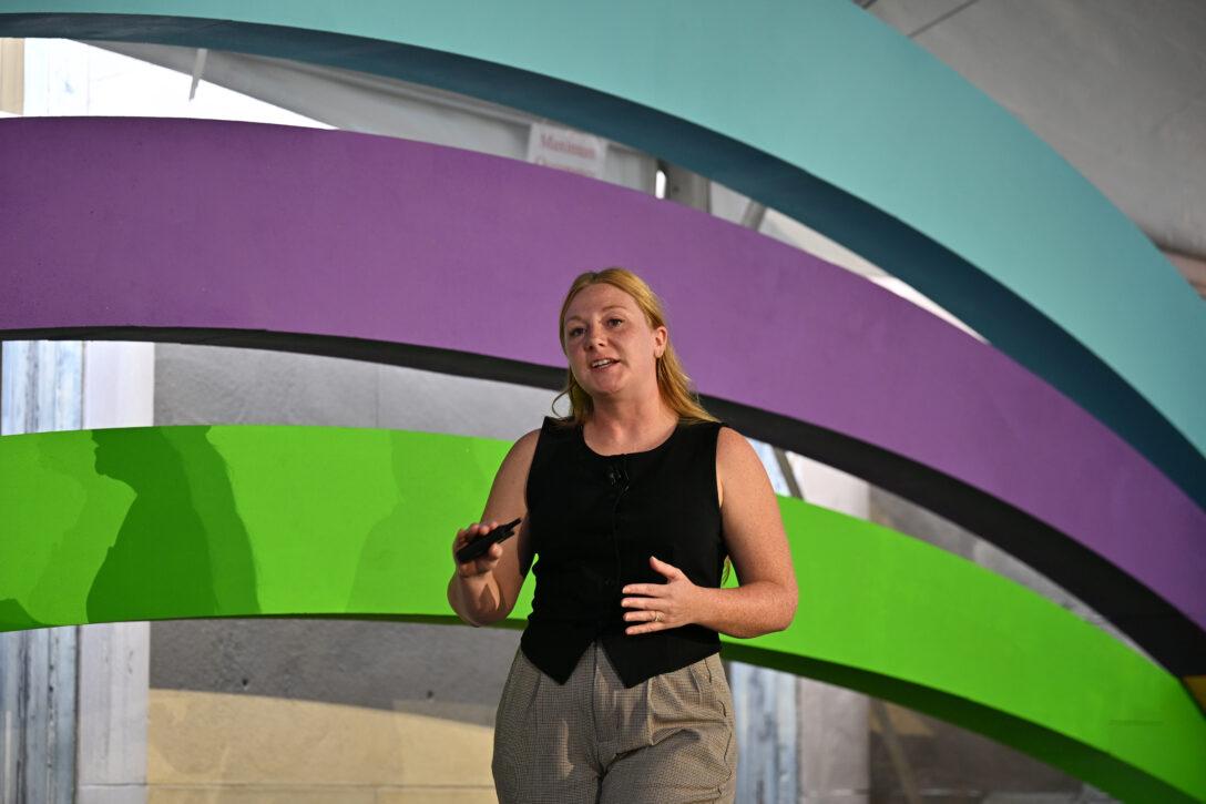 Mikayla Wilson, Senior Data Analyst at Workiva, presenting buying groups insights at OpsStars 2025