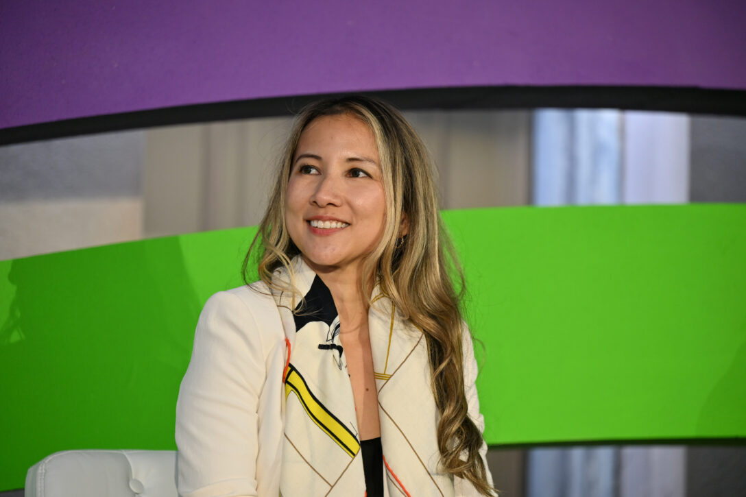 Trinity Nguyen, CMO at UserGems, speaking at OpsStars 2025