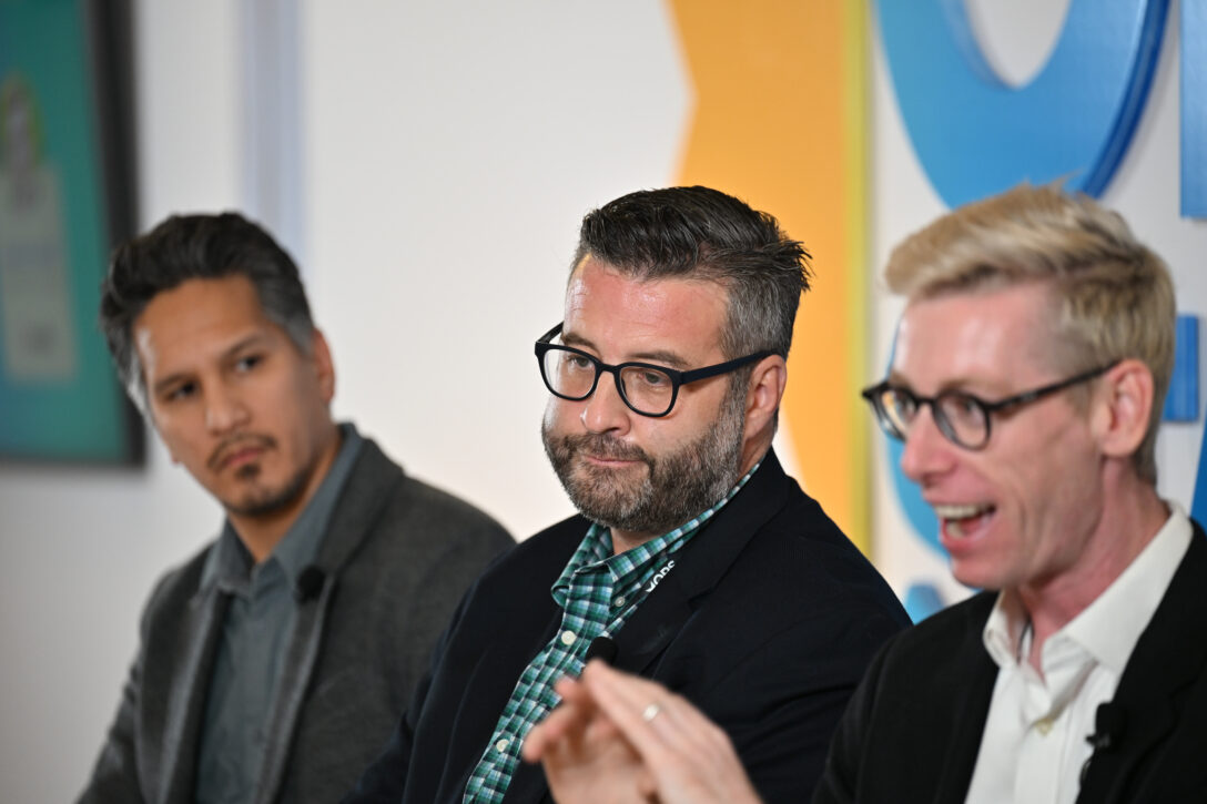 Cliff Simon, Randy Likas, and Charlie Wiebe speaking at OpsStars 2025