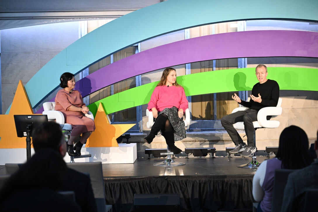 Michelle Ji-Yeun Kim, Larkin Dahal, and Craig Hanson speaking at OpsStars 2025