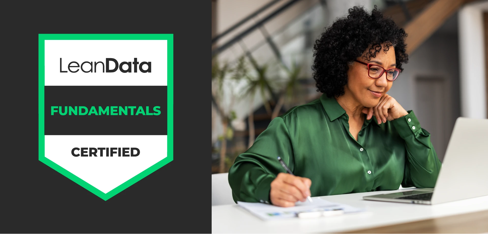 LeanData Fundamentals badge next to an image of a woman looking down at her laptop smiling