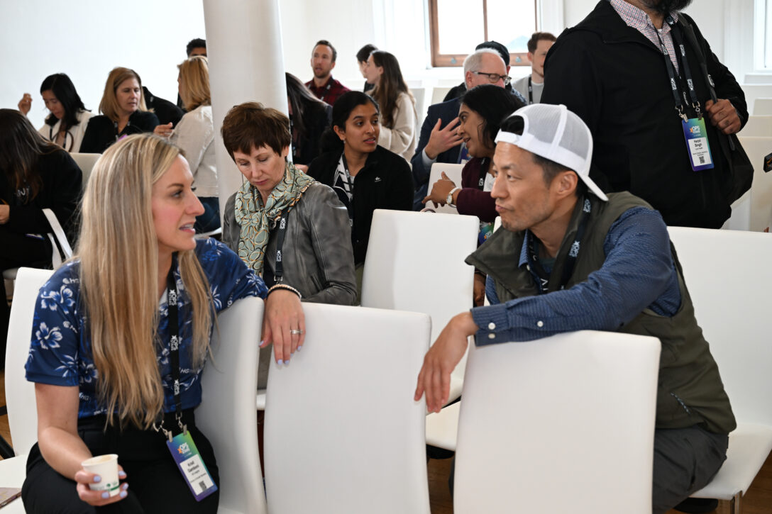 Ops Pros talking at an OpsStars conference sponsored by LeanData